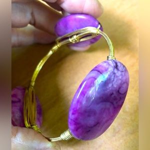 Wire wrapped bangle with purple stones